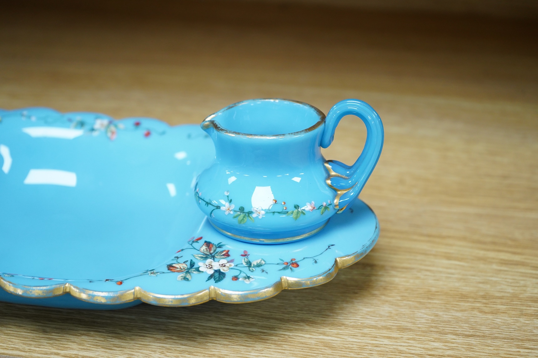 A 19th century opaline strawberry set, 30cm wide